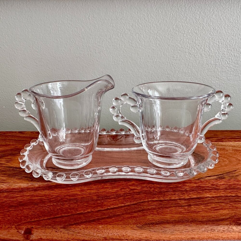 Imperial Glass Co. Candlewick beaded sugar and creamer with under tray.